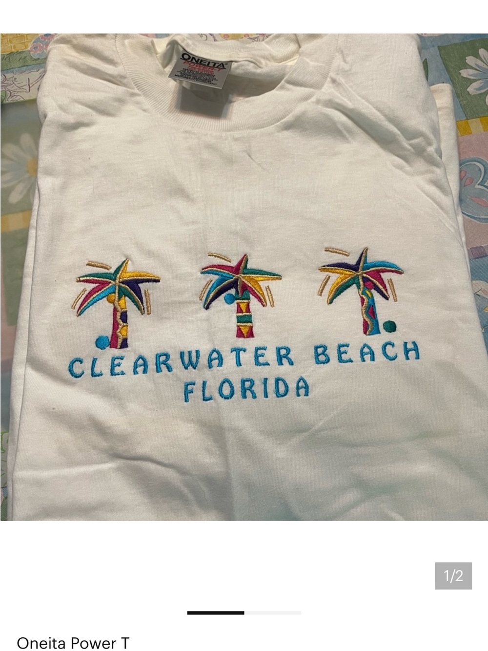 Women’s White Clearwater Beach Florida shirt & blue shorts.  Size Medium